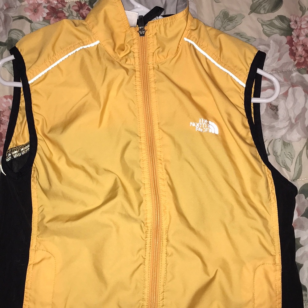 Yellow and blue sleeveless workout jacket